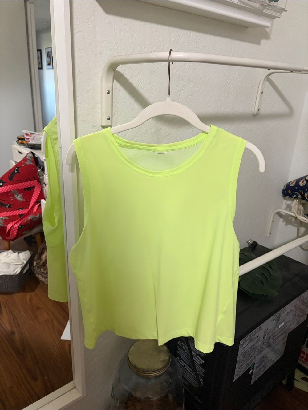 Athleta Neon Yellow Sleeveless workout top.